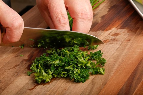 South German cuisine, vegetables, vegetarian, cutting parsley for vinaigrette, preparation, green