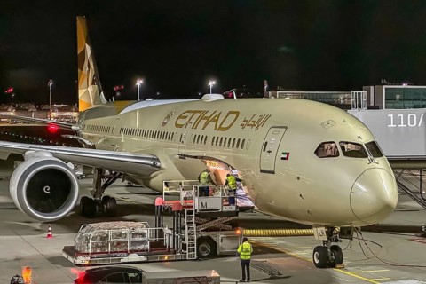 Etihad Boeing 787 aircraft at Munich Airport at night. Munich, Bavaria, Germany