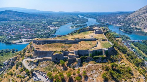 Aerial drone view of Rozafa Castle in the city Shkoder and its walls. Albania