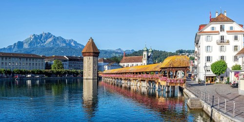 Lucerne city on the river Reuss with Chapel Bridge and Mount Pilatus panorama in Lucerne,