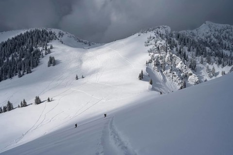 Mountain landscape in the snow, mountain peaks Tanzeck and Aiplspitz, dramatic clouds,
