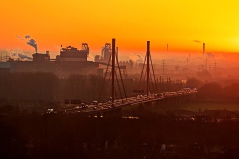 Atmospheric view of the ThyssenKrupp plant with the A 42 motorway at sunrise, Duisburg, North