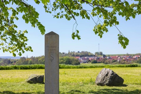 Memorial stone Friedenslinden 1813, in the background the village of Maxen with Finckenhöhe,