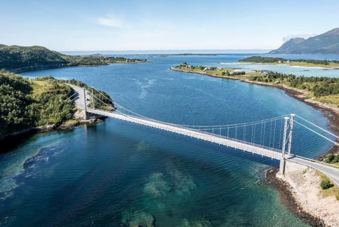 Aerial view of bridge over Straumsbotn fjord, Straumsnes peninsula in the back, RV 86 east of