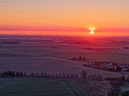 Sunrise over the countryside in the Drömling UNESCO Biosphere Reserve in the Altmark on a cold