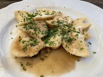 Delicious Schlutzkrapfen or Schlipfkrapfen, traditional dish in East Tyrol, Austria