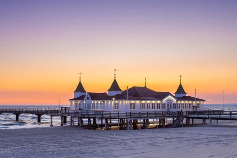 Restaurant on Ahlbeck Pier, Seebrücke Ahlbeck in the Baltic Sea at sunrise on Usedom island,