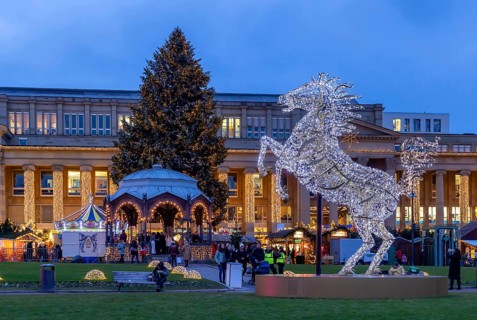Stuttgart Christmas market at the blue hour. Highlights with sights in front of the Königsbau on