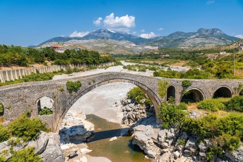 The Old Mes bridge near Shkoder. Albania, Europe. Ottoman stone arch bridge Ura e Kadiut
