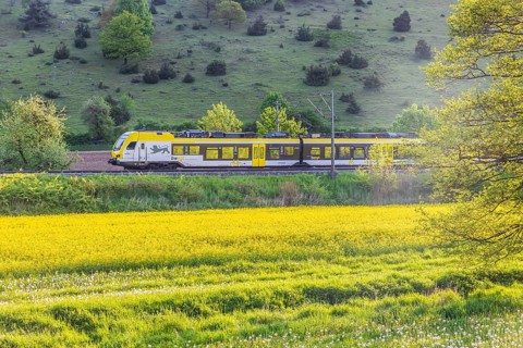 Regional railway, operated by Arverio, travelling across the Swabian Alb. Landscape near Lonsee in