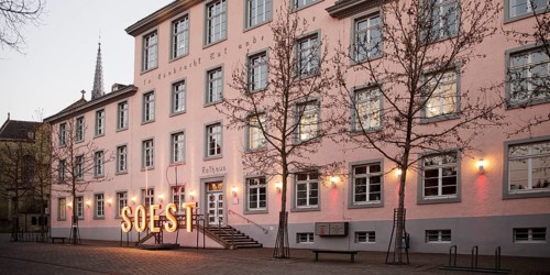 Illuminated town hall in the early evening at the Winterstrahlen Festival of Lights in Soest, North
