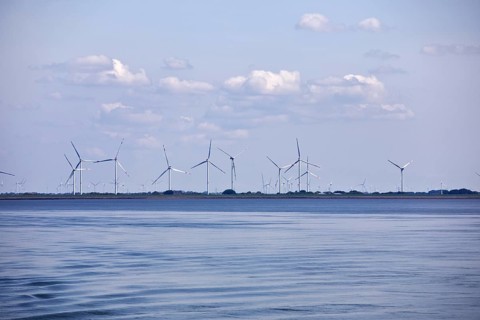Schleswig-Holstein Wadden Sea National Park with a view of wind turbines on the mainland, North