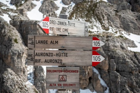Signpost on the hiking trail around the Drei Zinnen or Three Peaks, Dolomites, South Tyrol