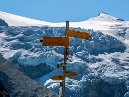 Hiking signpost at the Moiry glacier, Valais, Switzerland
