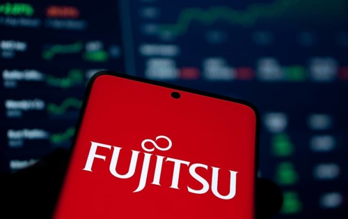 Fujitsu logo is displayed on smartphone. Fujitsu limited is a Japanese multinational tech company.