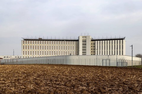 Stammheim prison, JVA. Exterior view with prison wall and barbed wire. Stuttgart,