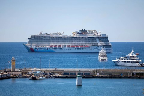 Cannes, France - 23 May 2024: A cruise ship anchors in front of the beach on the Promenade de la