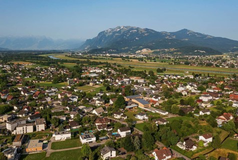 Drone image, view of town with parish church, Koblach, Rhine Valley, Vorarlberg, Austria