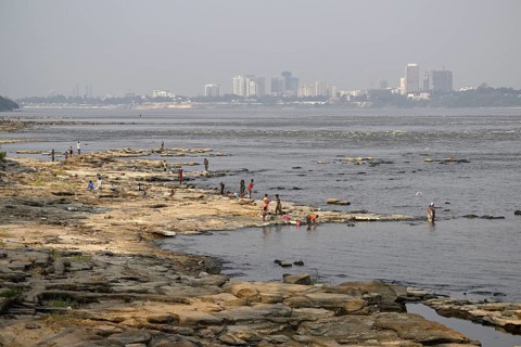 Women washing their laundry at the Congo River near the Malebo pool, formerly Stanley pool,