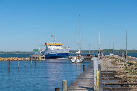 Small harbour on the island of Skarø, Skaroe, arrival of the car and passenger ferry from