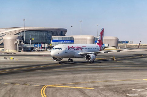 Air Arabia aircraft at Abu Dhabi Airport, Zayed International Airport with Terminal A. It has a