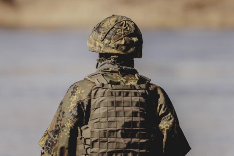 A soldier with helmet, taken during the military exercise 'Wettiner Schwert' with German and Czech