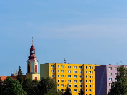 Old church and socialist prefabricated buildings, Stráž pod Ralskem, Czech Republic