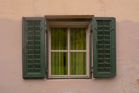 View of a window of a house in a mountain village, St.Peter, Villnöß, Funes, Villnößtal, South