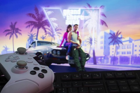 Dhaka, Bangladesh- 11 April 2025: A modern gaming setup featuring a gamepad and keyboard against a