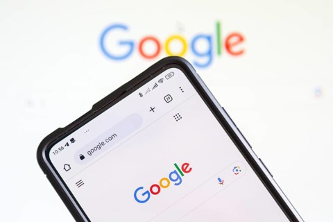 Google logo of the computer hardware software and search engine producer on a mobile phone and