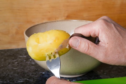 Swabian cuisine, preparation of Swabian potato salad with Stuttgarter Leberkäs in a