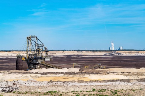 Stacker in the Welzow-Süd opencast lignite mine, Schwarze Pumpe power station in the background,