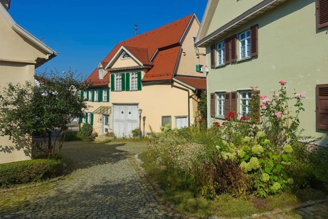 On the right Paul Jauch House, museum, exhibition building, memorial site, on the left at the back
