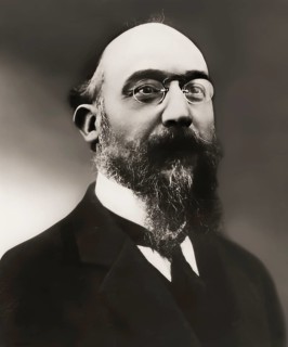 Erik Satie, 1866 – 1925, a French composer and pianist, portrait digitally edited according to a