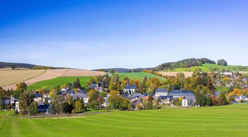 View of the village with church, rectory and primary school, Raschau, Erzgebirge, Saxony, Germany