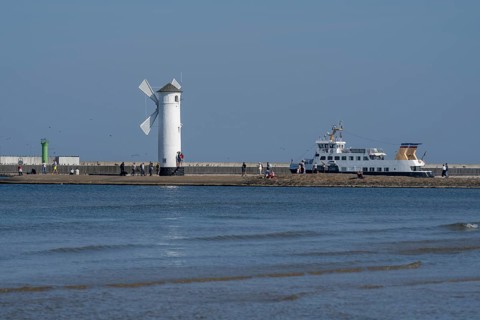 Mill beacon on the pier, excursion boat, Swinoujscie, Usedom Island, Baltic Sea, Poland