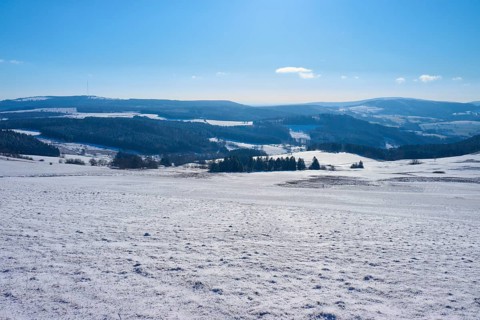 Snow-covered hills under a clear blue sky, winter, Heidelstein, Wasserkuppe, Gersfeld, Rhön, Hesse,