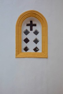 Mountain village Lakkoi with Agios Antonios church, church window, Crete, Greece