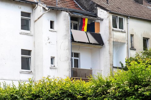 Two solar panels on a balcony in a backyard in Wuppertal, Germany