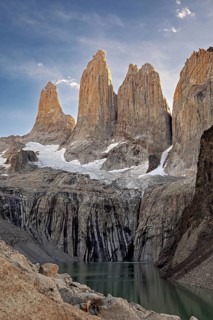 Towering spires above a turquoise-coloured lake in the soft morning light, The rock towers of