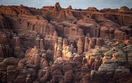 Stunning view of the unique rock formations in Arches National Park, Utah. The late afternoon sun