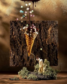 Surreal image capturing a mushroom cluster thriving inside a waffle cone, draped with flowing