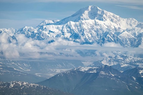 Clouds over high mountains, Mt Denali or Mount McKinley, aerial view, Alaska Range, Denali National
