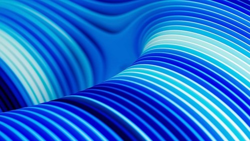 Colorful, flowing lines form a captivating abstract background, showcasing dynamic geometric shapes