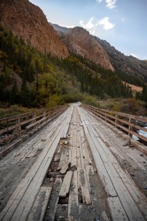 Wooden bridge with damage, Kichi-Naryn Gorge also known as Eki-Naryn Gorge, Naryn Province,