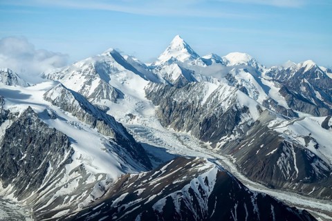 Snow and ice, epic mountains with glaciers, aerial view, Alaska Range, Denali National Park,