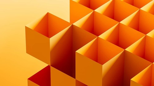 This graphic features an arrangement of 3D cubes in bright orange tones, forming an abstract