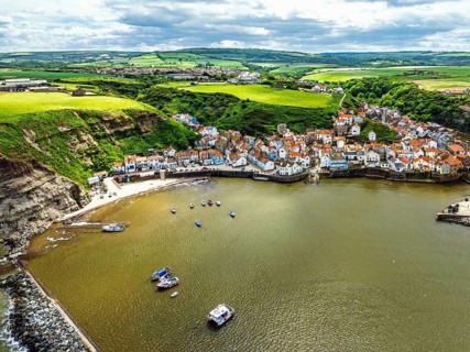Staithes Village from a drone, North Yorkshire, North York Moors National Park, England, United