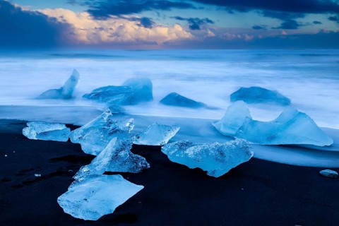 Ice chunks on black beach, lava beach, glacier ice, sea, sunset, winter, Diamond Beach