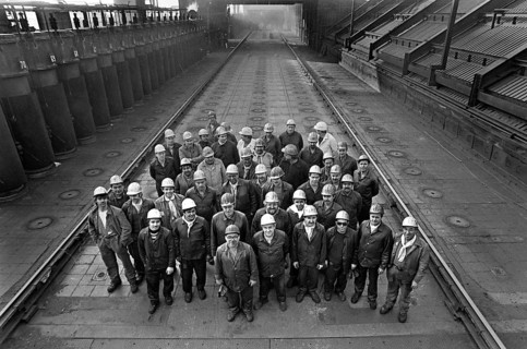 Essen, DEU, 17.11.85 - Workers at the Zollverein coking plant, shift group on the oven ceiling. The